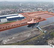 The brownfield docks will retain their industrial character