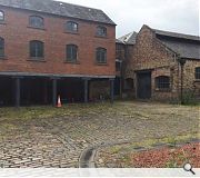 The project will entail demolition of existing brick and stone buildings