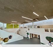 A double height atrium sits at the heart of the campus