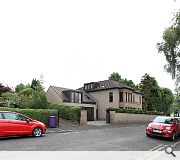 A large attached garage offers space for five vehicles