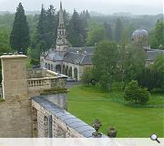 Ornamental urns have been reinstated above the main portico