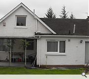 The ramshackle existing home sat awkwardly next to its ungainly extension