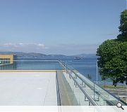 A roof terrace offers expansive views of the Cowal Peninsula