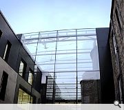 A light filled atrium sits at the heart of the scheme