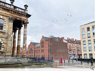 Crumbling Glasgow police station to live on as flats