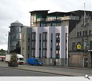 A feature granite clad corner tower is planned 