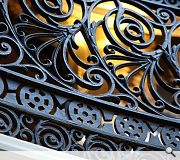 Wrought iron railings on a feature staircase have been sensitively restored