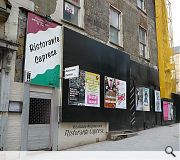 Demolition signage has already sprouted on the condemned buildings