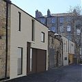 Low carbon mews to complete a New Town street Low carbon mews to complete a New Town street