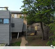 The new entrance had to be cut through a listed boundary wall