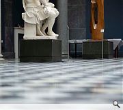 View of the Sculpture Court with a 19th-century  plaster cast of Lorenzo di Medici by Michelangelo and Requiem by Barbara Hepworth (1957) in the background