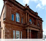 A new civic space fronts the restored hall