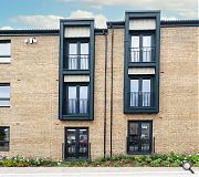 Timber frame homes are built around precast concrete stairwells