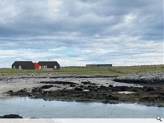 Corrugated aluminium home to domesticate the harsh environment of Tiree