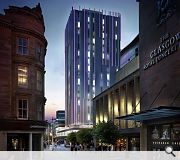 A night lighting scheme communicates Premier Inn's corporate colours