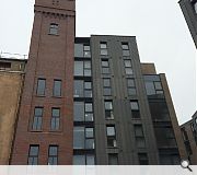  An un-listed brick water tower at the heart of the former Scotstoun Flour Mill has been rebuilt as part of the scheme.