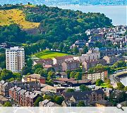 A flat roof will help mitigate encroachment upon the views of others