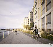 The waterfront will be opened up with a commerce-lined amenity space