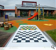 The playground had graphics and games painted directly onto the play surface