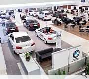 Well lit clinical interiors are designed to sell the BMW brand