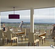 A rooftop restaurant will offer panoramic views across the Old Course and White Sands beach