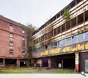 This view prior to a start being made on site illustrates the enormity of the challenge in traking on the old stables