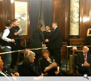 Isabel & Carla Garriga receive some champagne from David Dunbar and Neil Baxter