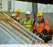 The First Minister is given a guided tour of the factory floor by Geoff Crowley