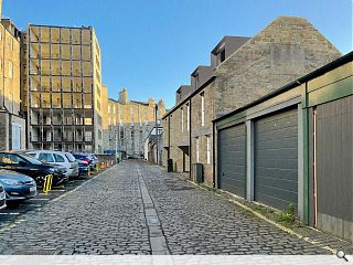 Mews infill to restore order to a forgotten Edinburgh lane