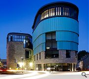 New buildings are arranged to form a continuous street frontage