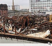 Contractors require to remove the front facade to remove fallen beams