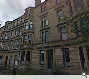 This bay windowed tenement would be demolished to make way for the school