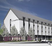 The hotel will be faced in white render, zinc and timber