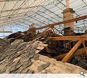 The dangerous roof was carefully dismantled, preserving surviving slate