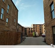 Apartments wrap around an interior courtyard