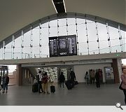 A curvaceous concourse whisks passengers down to platform level