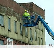 The blocks have become a health hazard after becoming infested with flocks of pigeons