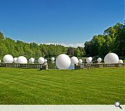 A cluster of opaque bubbles, up to 4m in diameter, puncture the landscape in Scattered