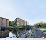 A warehouse top the rear will be levelled to make way for a riverfront extension 