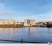 Flood risks are mitigated by raising accommodation above undercroft parking