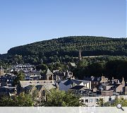 A jagged roof profile reflects the jumbled skyline of the historic Borders town