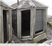 Loose slates and stonework have fallen onto neighbouring properties