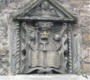 An ornate carving gives the tenement its unusual name