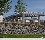 The square is bounded by fieldstone dykes and a community pavilion