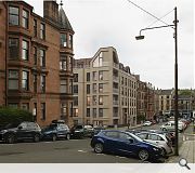 The corner bay is modelled on the decorative turrets of nearby tenements