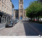 Ingram Street has seen significant public realm enhancements in recent years