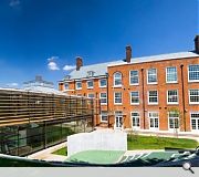 Extensions frame a landscaped courtyard