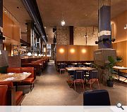 Exposed masonry complements half height decoration
