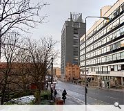 A feature cylindrical structure marks access to the roof