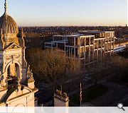 A 200m long reconstituted stone colonnade embraces the street